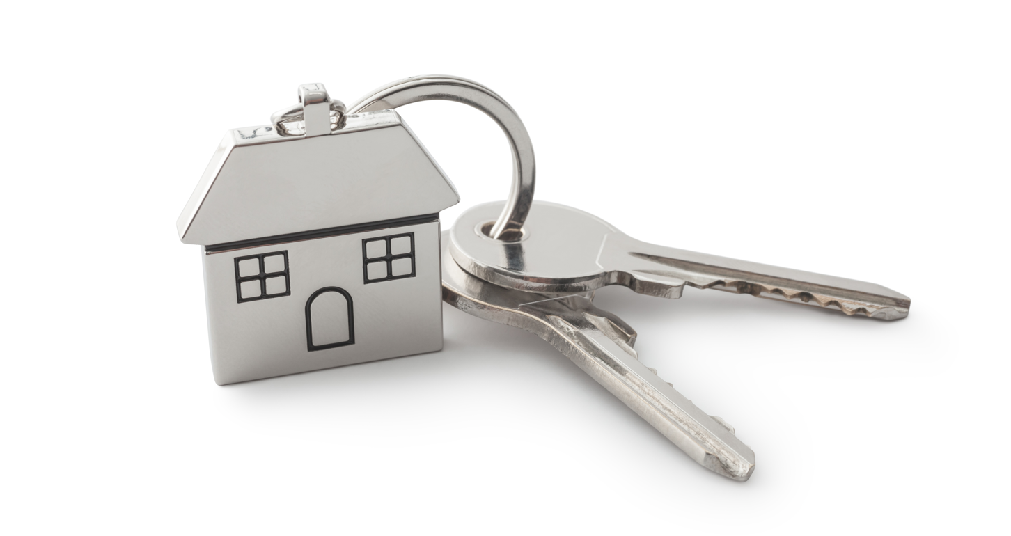 Two keys on a key ring with a house shaped keychain